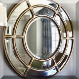 D02. Round beveled glass mirror. 40”h 